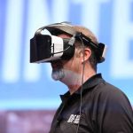 Intel’s Craig Raymond displays the Project Alloy virtual reali