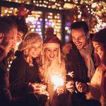 Friends With Sparklers At The New Year Party