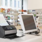 Prescription and drug lying on counter of a pharmacy